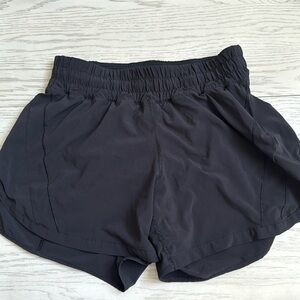 Lululemon Black Track That 4’ shorts